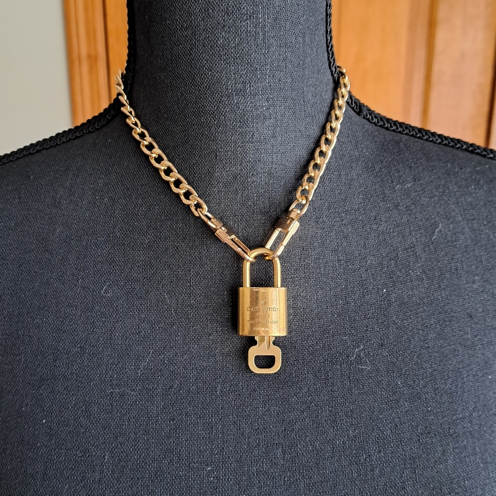 Louis Vuitton Lock and Key #342 and 16" unmarked chain